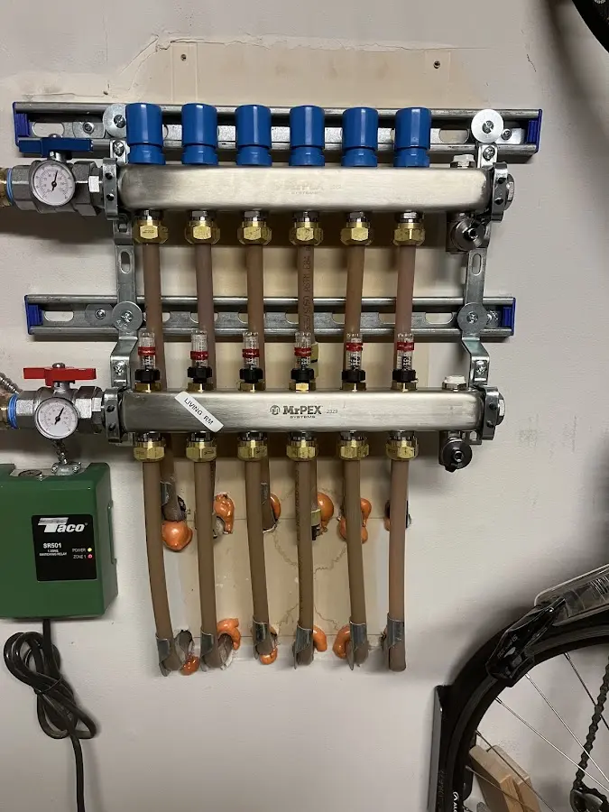 Plumber performing Water Heater Repair at a residential property in Box Elder