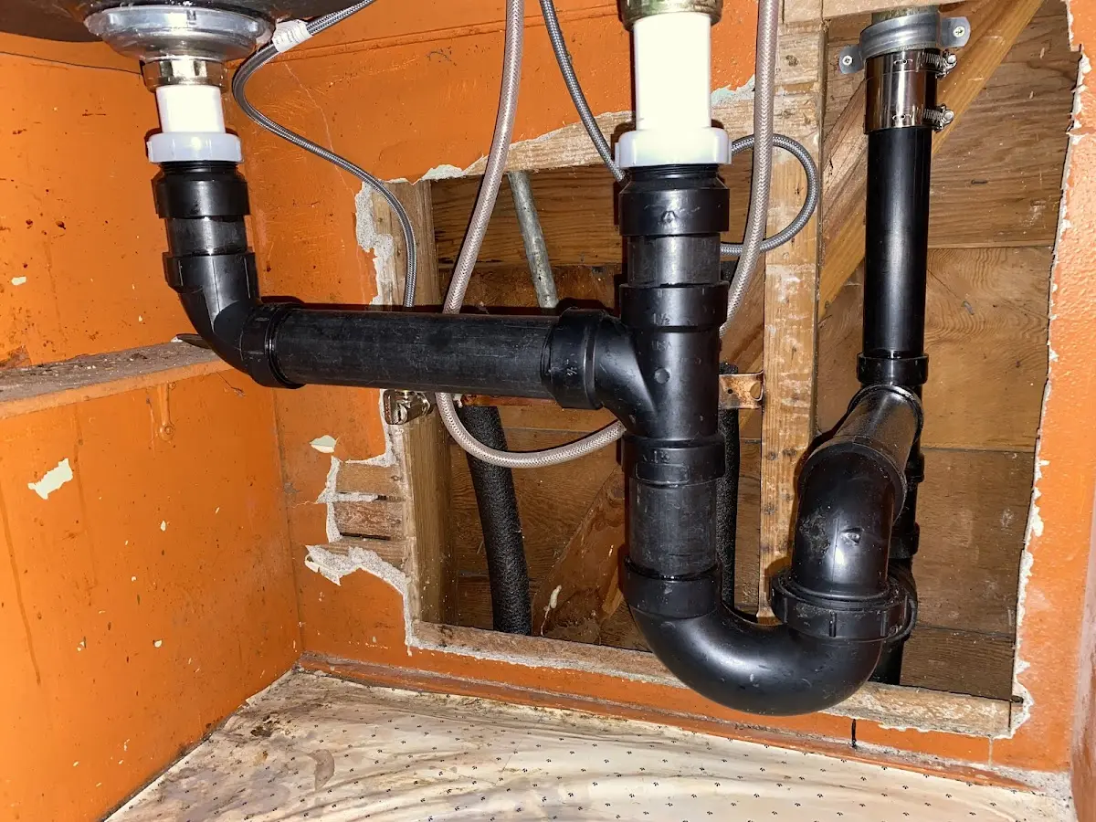 Professional Garbage Disposal Repair equipment and tools on the job in Box Elder